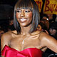 British singer Alexandra Burke arrives at the 30th Brit Awards ceremony at Earl`s Court in London