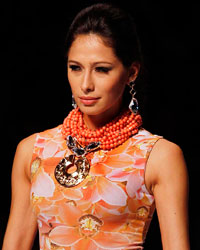 A model presents a creation by Colombian designer Andres Otalora during the Cali Exposhow in Cali