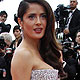 Salma Hayek poses on the red carpet for the opening ceremony of the 64th Cannes Film Festival in Cannes