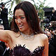 Chinese actress Gong Li arrives on the red carpet for the opening ceremony of the 64th Cannes Film Festival in Cannes