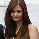 Madhur Bhandarkar, Aishwarya Rai Bachchan and Ronnie Screwvala pose during a beach front photocall at the 64th Cannes Film Festival