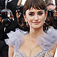 Penelope Cruz and Johnny Depp pose as they arrive on the red carpet for the screening of their film 'Pirates Of The Caribbean: On Stranger Tides' at the 64th Cannes Film Festival