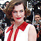 Actress Milla Jovovich arrives on the red carpet for the screening of the film 'La Conquete' at the 64th Cannes Film Festival