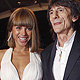 Rolling Stones' guitarist Ron Wood (R) and his girlfriend Ana Araujo arrive on the red carpet for the screening of the film 'Melancholia' at the 64th Cannes Film Festival