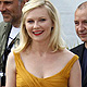 Cast members Charlotte Gainsbourg (L) and Kirsten Dunst arrive to attend a photocall for the film 'Melancholia', by director Lars Von Trier, in competition at the 64th Cannes Film Festival