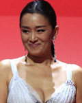 Actress Gong-Li arrives on stage for the awards ceremony of the 65th Cannes Film Festival