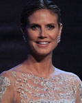 Model Heidi Klum and Film producer Harvey Weinstein attend an auction at the amfAR's Cinema Against AIDS 2012 event in Antibes during the 65th Cannes Film Festival