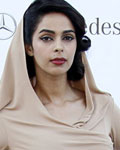 Mallika Sherawat arrives for the amfAR's Cinema Against AIDS 2012 event in Antibes during the 65th Cannes Film Festival