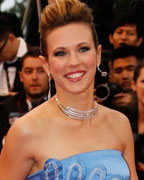 Singer Lorie poses on the red carpet as she arrives for the screening of the film 'The Great Gatsby' and for the opening ceremony of the 66th Cannes Film Festival in Cannes