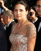 Cast members Michael Douglas and Matt Damon, accompanied by his wife Luciana Barroso leave after the screening of the film 'Behind the Candelabra' in competition during the 66th Cannes Film Festival