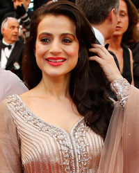 Amisha Patel and Puja Gupta pose on the red carpet as they arrive for the screening of the film 'All is Lost' in competition during the 66th Cannes Film Festival