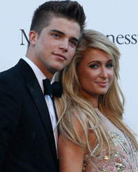 Model River Viiperi and socialite Paris Hilton arrive for amfAR's Cinema Against AIDS 2013 event in Antibes during the 66th Cannes Film Festival