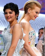 Mistress of Ceremony actress Audrey Tautou and Jury member of the 66th Cannes Film Festival actress Nicole Kidman pose on stage during the opening ceremony of the 66th Cannes Film Festival in Cannes