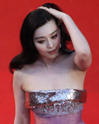 Actress Fan Bing Bing poses on the red carpet as she arrives for the screening of the film 'The Great Gatsby' and for the opening ceremony of the 66th Cannes Film Festival