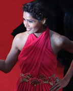 Actress Freida Pinto poses on the red carpet as she arrives for the screening of the film 'The Great Gatsby' and for the opening ceremony of the 66th Cannes Film Festival