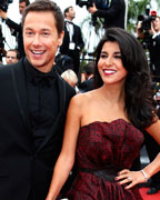 Actor Stephane Rousseau and actress and director Reem Kherici pose on the red carpet for the screening of the film 'Jeune