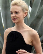 Cast member Carey Mulligan leaves after a photocall for the film 'The Great Gatsby' before the opening of the 66th Cannes Film Festival