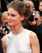 Director Francois Ozon and cast member Marine Vacth pose as they arrive for the screening of the film 'Jeune