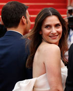 Director Francois Ozon and cast members Geraldine Pailhas and Marine Vacth pose as they arrive for the screening of the film 'Jeune