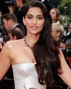 Sonam Kapoor poses on the red carpet as she arrives for the screening of the film 'Jeune