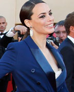 Cast member Berenice Bejo poses on the red carpet as she arrives for the screening of the film 'Le Passe' (The Past) in competition during the 66th Cannes Film Festival in Cannes