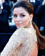 Actress Eva Longoria poses on the red carpet as she arrives for the screening of the film 'Le Passe' (The Past) in competition during the 66th Cannes Film Festival