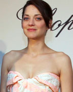 Actress Marion Cotillard attends a photocall presenting the 'Green Carpet Collection' by luxury brand Chopard during the 66th Cannes Film Festival in Cannes