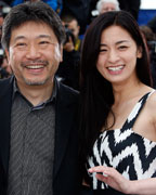 Director Hirokazu Kore-eda poses with cast members Machiko Ono and Yoko Maki during a photocall for the film 'Soshite Chichi Ni Naru' (Like Father, Like Son) at the 66th Cannes Film Festival