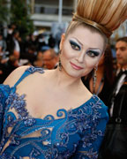 Former television presenter Elena Lenina poses on the red carpet as she arrives for the screening of the film 'Jimmy P.' (Psychotherapy of a Plains Indian) in competition at the 66th Cannes Film Festival