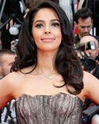 Mallika Sherawat poses on the red carpet as she arrives for the screening of the film 'Inside Llewyn Davis' in competition during the 66th Cannes Film Festival