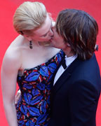 Nicole Kidman kisses her husband Keith Urban on the red carpet as they arrive for the screening of the film 'Inside Llewyn Davis' in competition during the 66th Cannes Film Festival