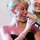 Kylie Minogue performs with Sharon Stone at the amfAR Cinema Against AIDS 2007 event in Mougins during the 60th Cannes Film Festival