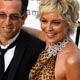 Sharon Stone and U.S. fashion designer Kenneth Cole arrive at amfAR`s Cinema Against AIDS 2008 event in Mougins during the 61st Cannes Film Festival