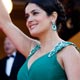 Actress Salma Hayek waves as she arrives for the world premiere screening of the film Indiana Jones and the Kingdom of the Crystal Skull