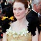 Cast members Julianne Moore arrives with Alice Braga and Yoshino Kimura for the screening of Brazilian director Fernando Meirelles` film entry Blindness on the opening night of the 61st Cannes Film Festival