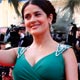 Actress Salma Hayek waves as she arrives for the world premiere screening of the film Indiana Jones and the Kingdom of the Crystal Skull