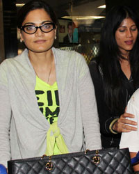 Celebs Arrive From IIFA 2013