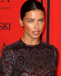 Adriana Lima arrives at the 2013 Council of Fashion Designers of America (CFDA) awards in New York