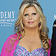 Musician John Fogerty and his wife Julie arrive at the 45th annual Academy of Country Music Awards in Las Vegas