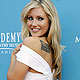 Singer Whitney Duncan shows off her U.S. flag tattoo as she arrives at the 45th annual Academy of Country Music Awards in Las Vegas