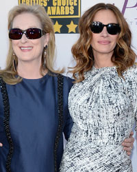 Actresses Meryl Streep (L) and Julia Roberts arrive at the 19th annual Critics' Choice Movie Awards in Santa Monica, California