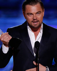 Leonardo DiCaprio accepts the award for best actor in a comedy for 'The Wolf of Wall Street' during the 19th annual Critics' Choice Movie Awards in Santa Monica, California