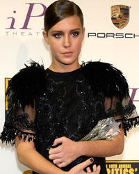 Actress Adele Exarchopoulos poses backstage with her best young actor/actress award for her role in the film 'Blue is the Warmest Color' at the 19th annual Critics' Choice Movie Awards in Santa Monica, California