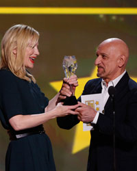 Ben Kingsley presents actress Cate Blanchett the award for best actress for her role in 'Blue Jasmine' at the 19th annual Critics' Choice Movie Awards in Santa Monica, California