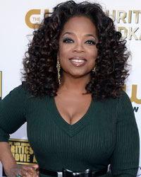 Oprah Winfrey arrives at the 19th annual Critics' Choice Movie Awards in Santa Monica, California