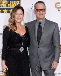 Actors and husband and wife Rita Wilson and Tom Hanks arrive at the 19th annual Critics' Choice Movie Awards in Santa Monica, California