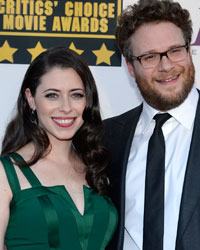 Actors and husband and wife Seth Rogan and Lauren Miller arrive at the 19th annual Critics' Choice Movie Awards in Santa Monica, California