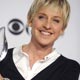 Comedian Ellen Degeneres poses with her award at the 35th annual People`s Choice awards in Los Angeles