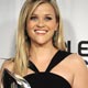 Reese Witherspoon poses with her award for Favorite Female Movie Star at the 35th annual People`s Choice awards in Los Angeles