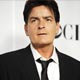 Actor Charlie Sheen stands backstage at the 35th annual People`s Choice awards in Los Angeles